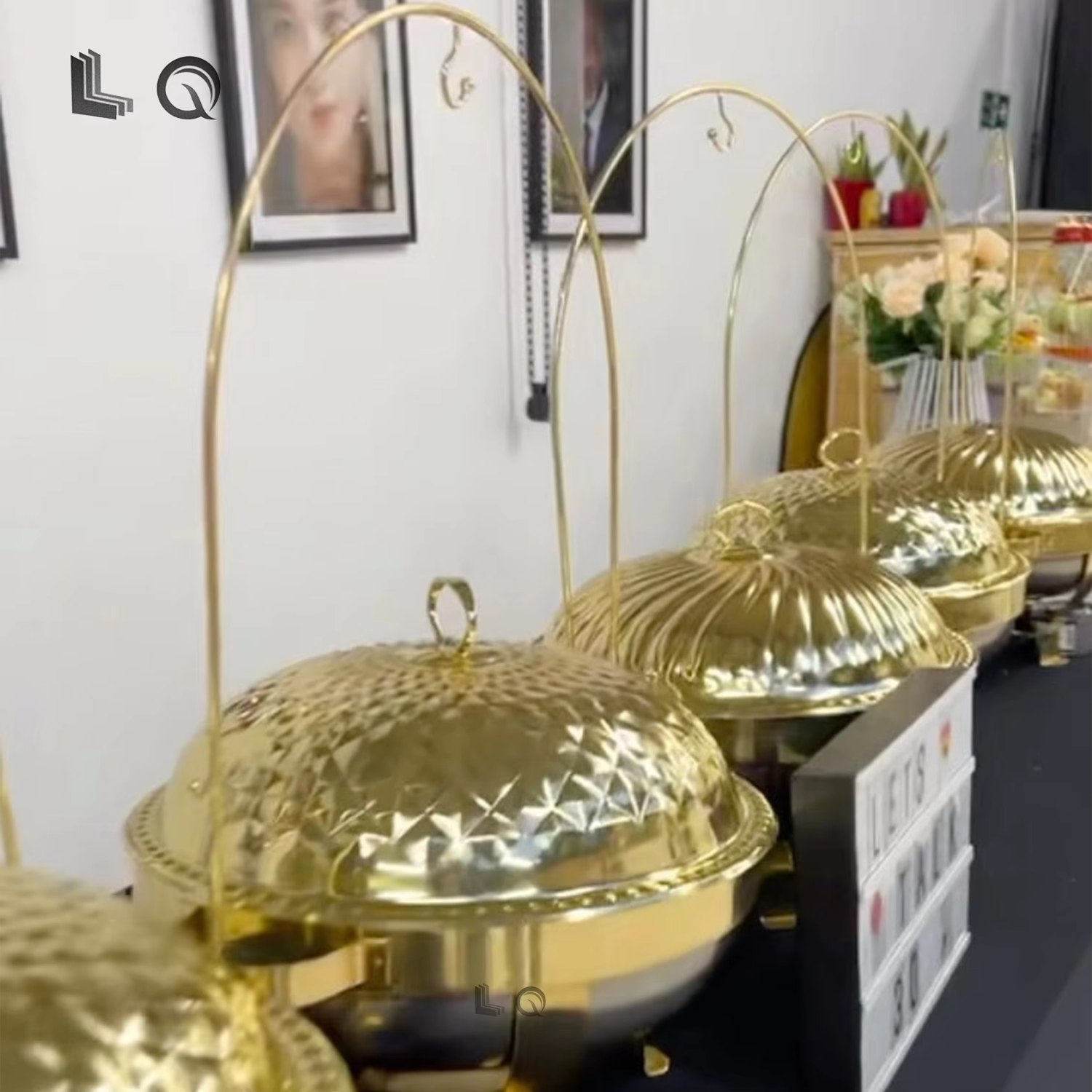 Arched gold buffet dishes lined up